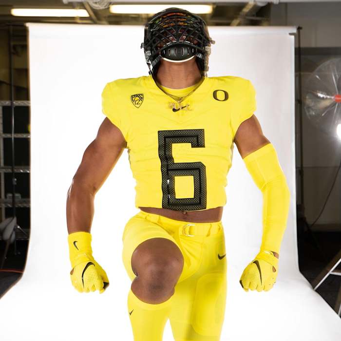 TJ Dudley yells during a photoshoot on his Oregon official visit.